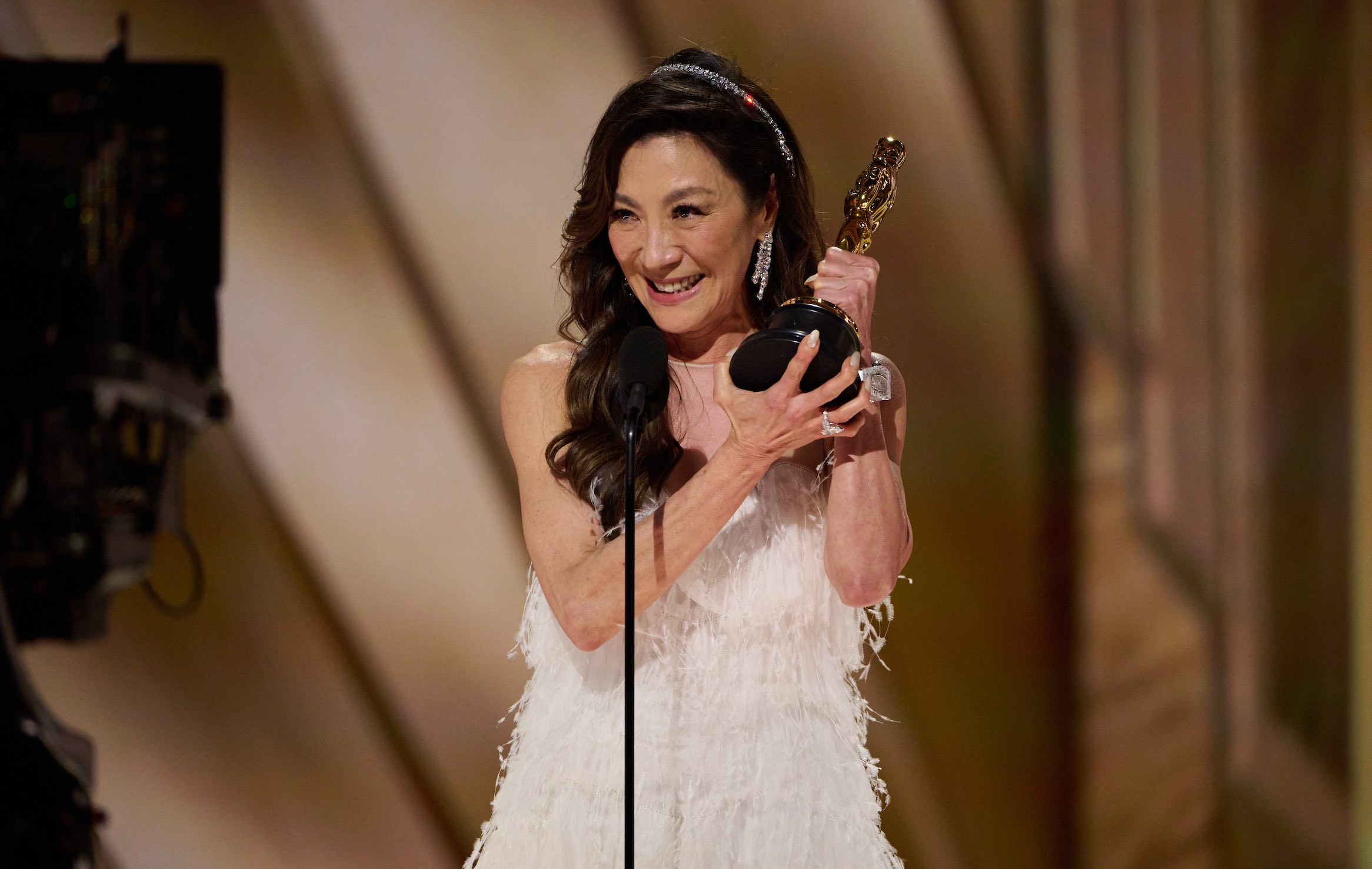 History is made at night: Yeoh, born in Malaysia, is the first Asian performer to win a Best Actress in a Leading Role Oscar. / Photo by Blaine Ohigashi, courtesy of ©A.M.P.A.S.